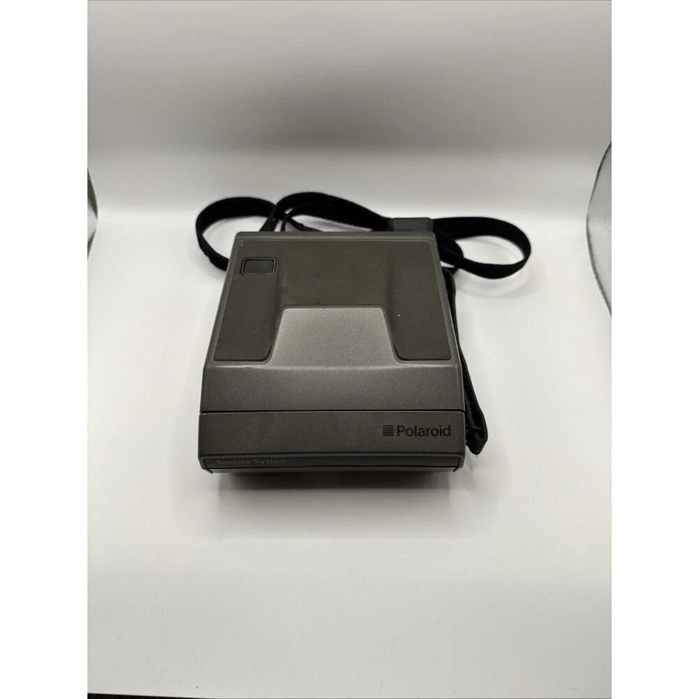 PREOWNED VINTAGE POLAROID SPECTRA SYSTEM POLAROID CAMERA